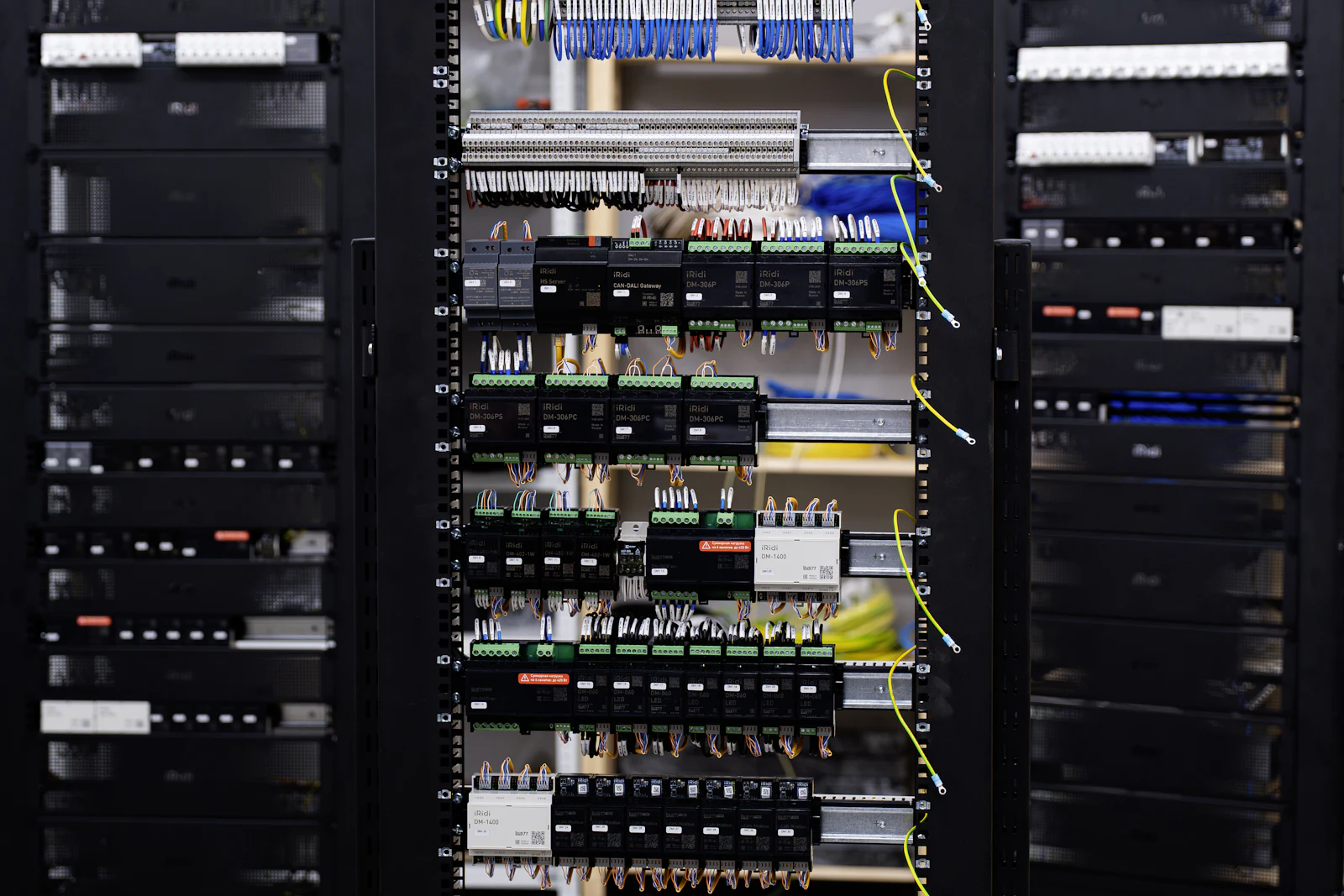 Open electrical control panel with wiring and breakers